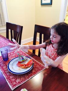 Molly enjoying her uncooked pizza.